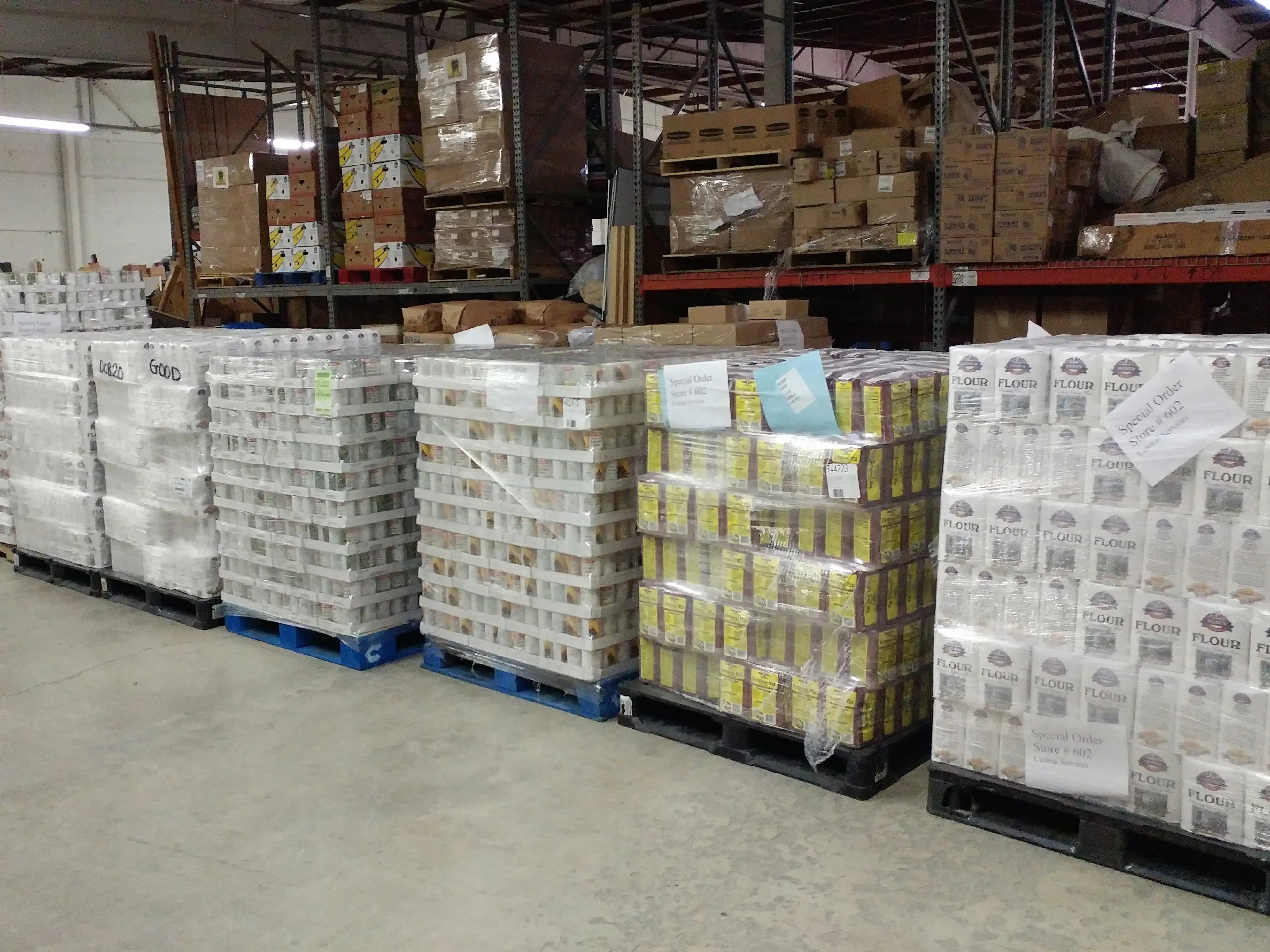 Pallets of food stored in the food pantry at Central Services