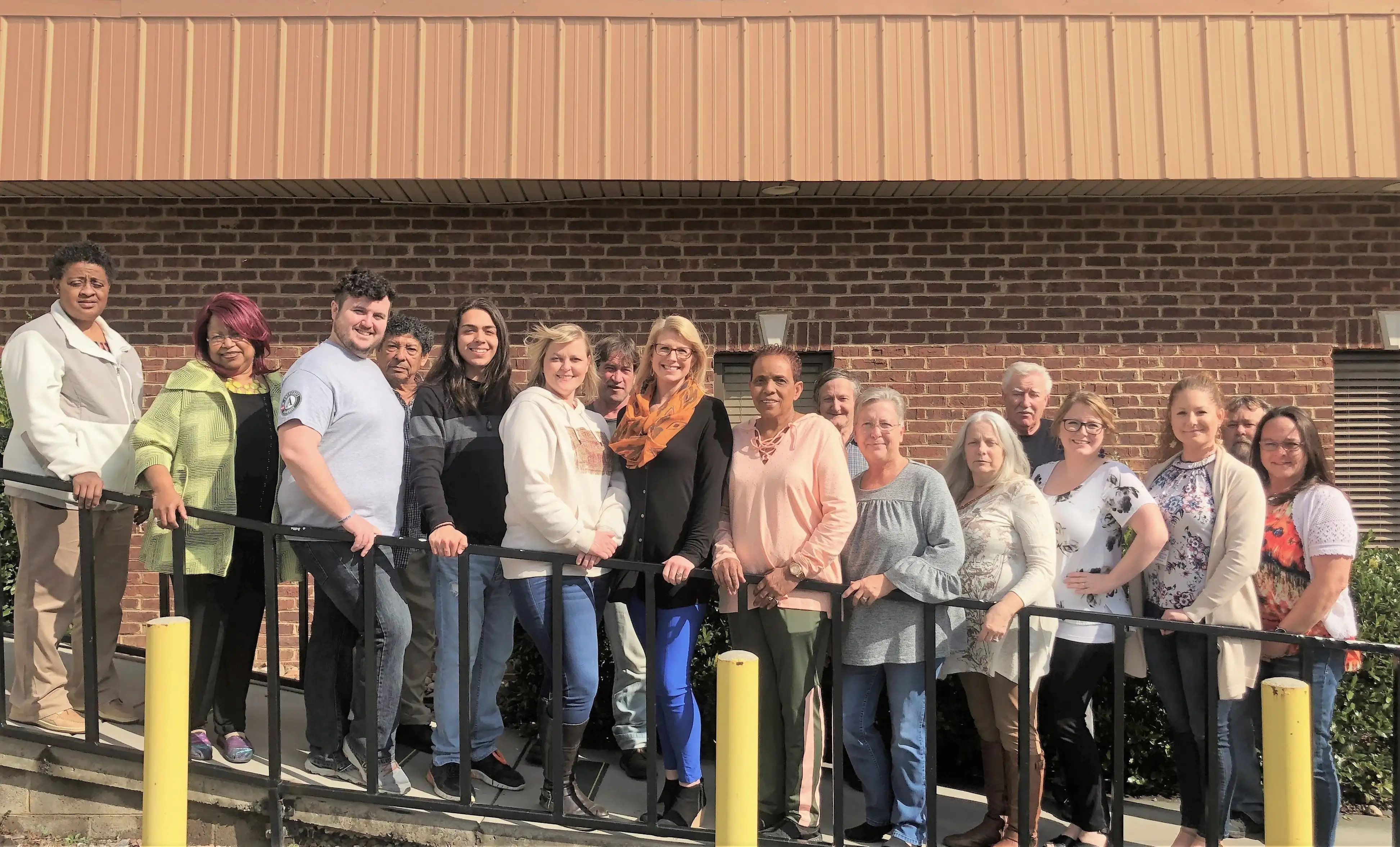 Central Services Staff outside the building